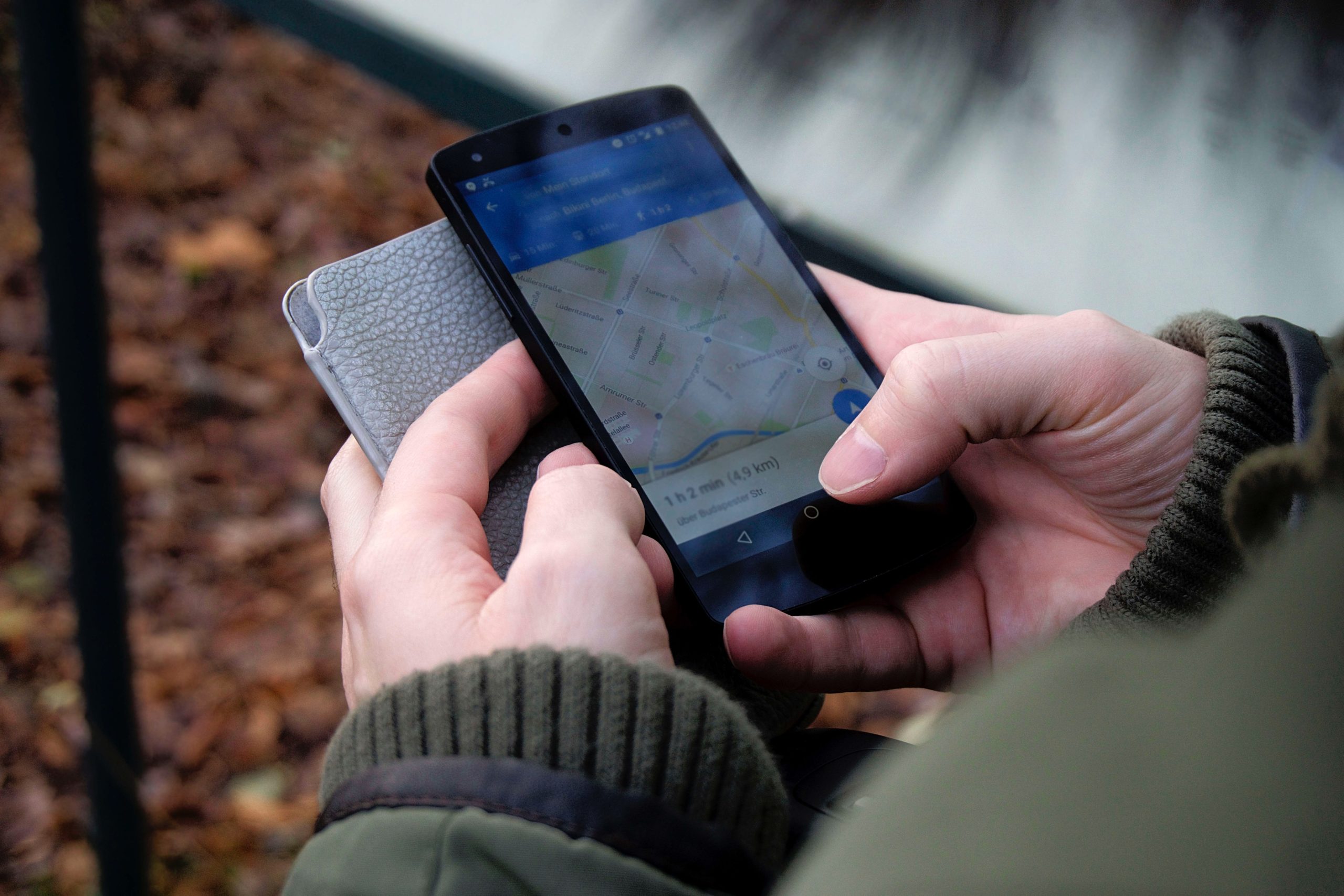Millennial Using Google Maps on Phone